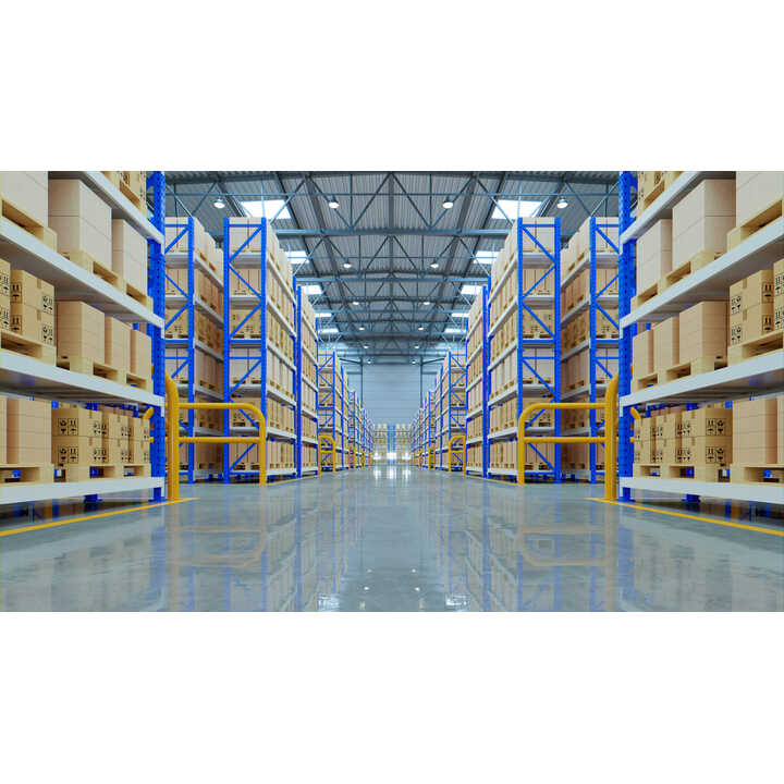 A spacious warehouse with tall shelves filled with stacked cardboard boxes.